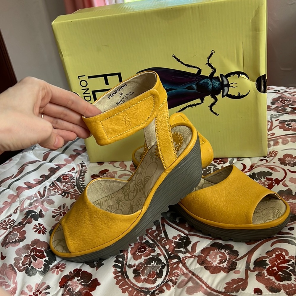 Yellow leather Fly London comfy wedges